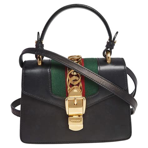 sylvie mini gucci|Gucci mini sylvie top handle.